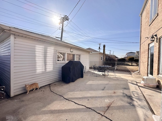 exterior space featuring a patio and fence