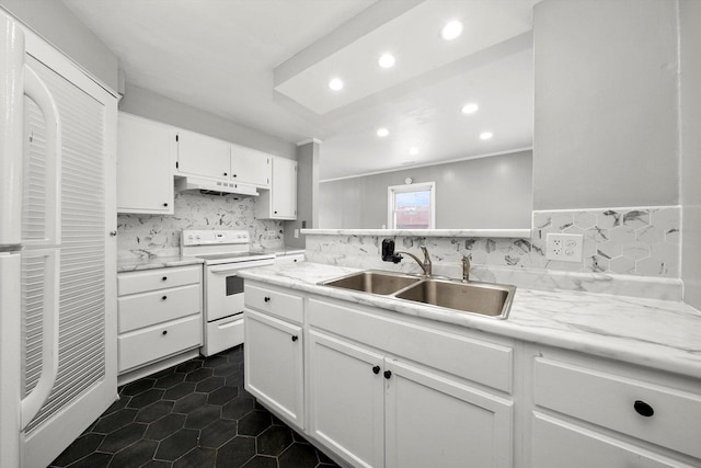 kitchen with white electric range oven, light countertops, under cabinet range hood, and a sink