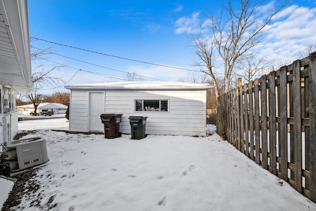 exterior space featuring an outbuilding and a fenced backyard