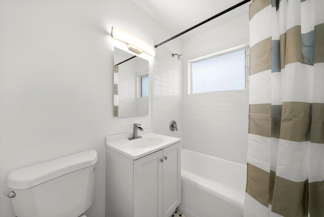 bathroom featuring vanity, toilet, and shower / bathtub combination with curtain