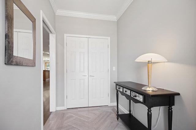 corridor featuring baseboards and ornamental molding