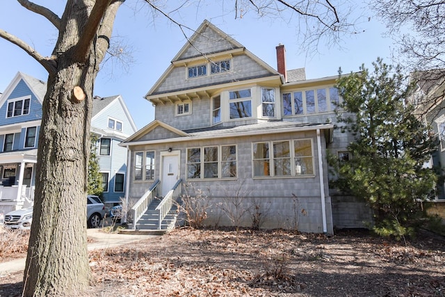 view of front of property with a chimney