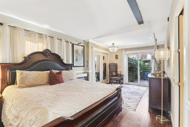 bedroom with wood-type flooring, access to exterior, and crown molding