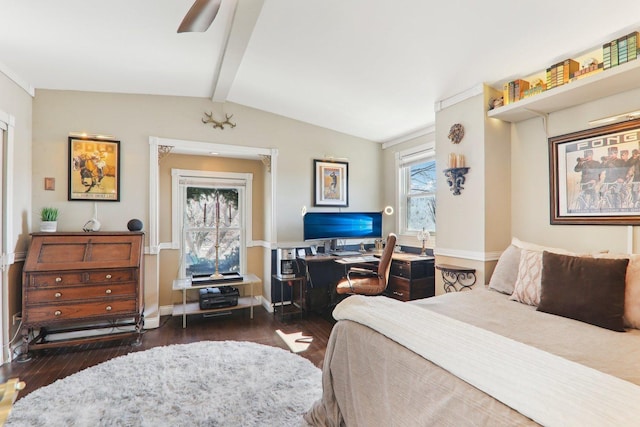 bedroom featuring baseboards, wood finished floors, and vaulted ceiling with beams