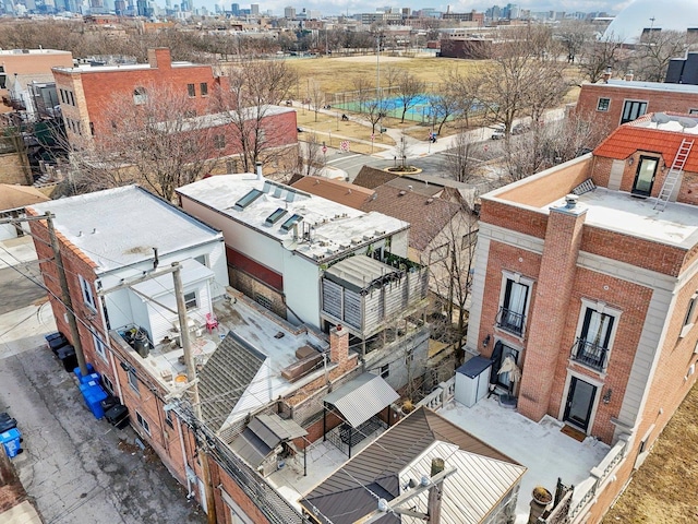 birds eye view of property featuring a city view