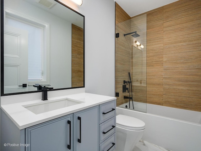 full bathroom with shower / bath combination, visible vents, toilet, and vanity