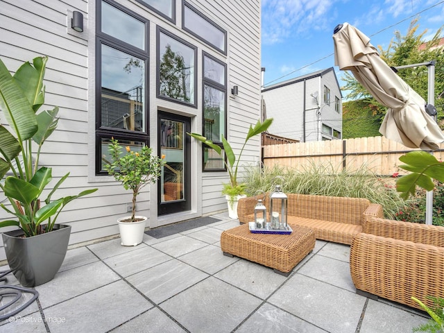 view of patio / terrace with fence