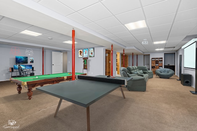 game room featuring a drop ceiling and carpet floors