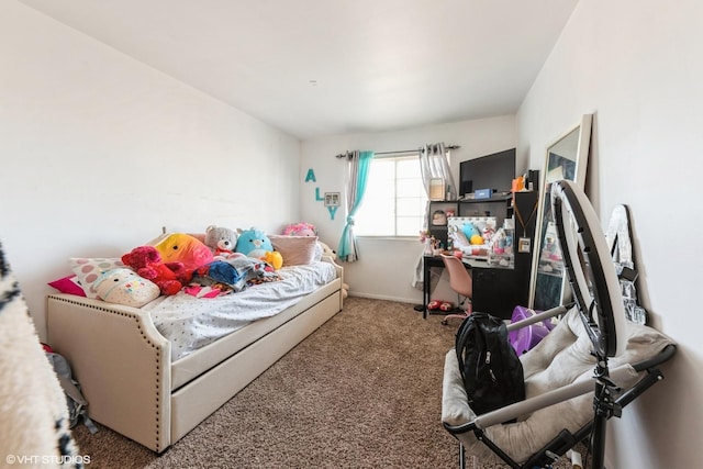 bedroom featuring carpet