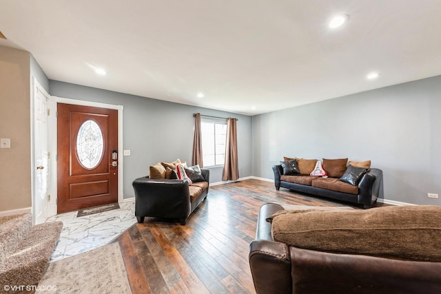 living room with wood finished floors, recessed lighting, and baseboards