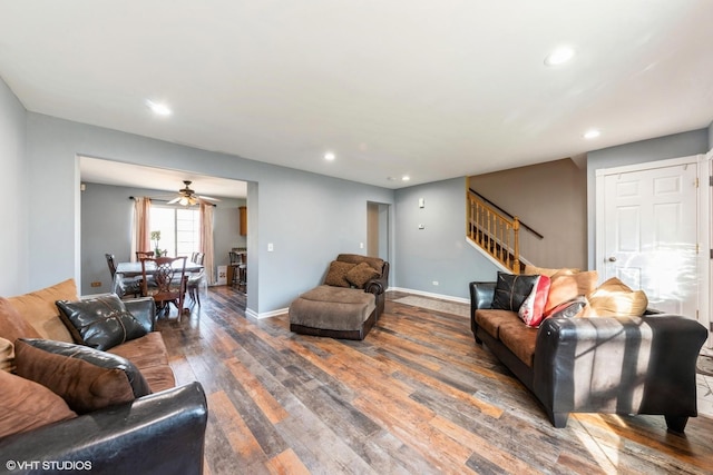 living area featuring stairway, recessed lighting, baseboards, and wood-type flooring