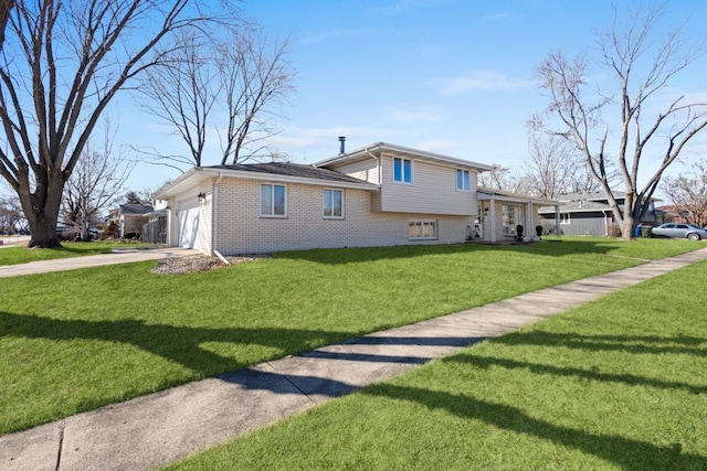 view of property exterior featuring brick siding, a lawn, driveway, and a garage