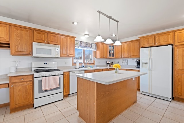 kitchen featuring glass insert cabinets, light countertops, brown cabinets, light tile patterned flooring, and white appliances