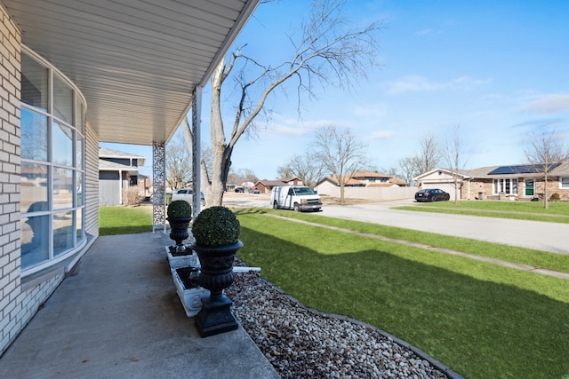 view of yard featuring a residential view