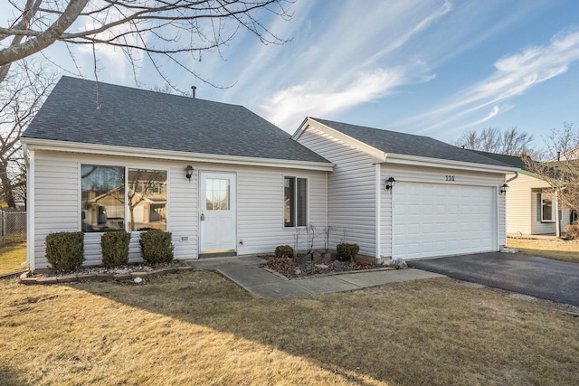 ranch-style house featuring aphalt driveway, an attached garage, a front yard, and a shingled roof