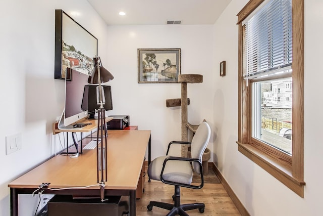 office featuring recessed lighting, wood finished floors, visible vents, and baseboards