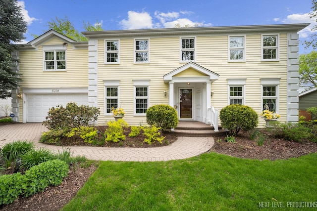 1408 N W St, Naperville, IL 60563 - view of front facade featuring a front lawn and an attached garage
