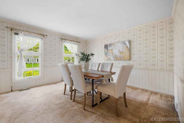1408 N W St, Naperville, IL 60563 - carpeted dining space with wallpapered walls, visible vents, and wainscoting