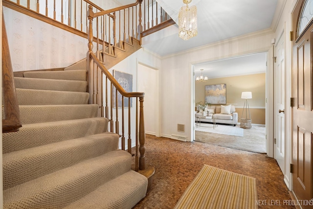 1408 N W St, Naperville, IL 60563 - stairway featuring crown molding, baseboards, carpet floors, and a notable chandelier
