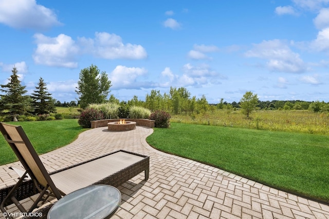 view of patio featuring a fire pit