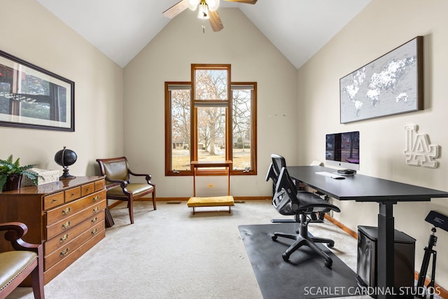 office space featuring a ceiling fan, lofted ceiling, carpet, and baseboards