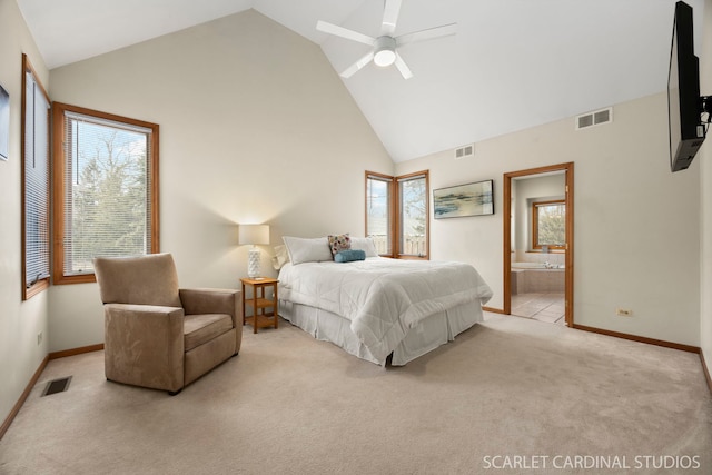 bedroom with visible vents, high vaulted ceiling, and carpet