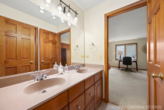 full bathroom with a sink and double vanity