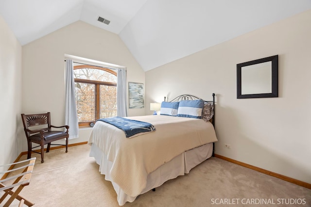 bedroom featuring visible vents, lofted ceiling, light colored carpet, and baseboards