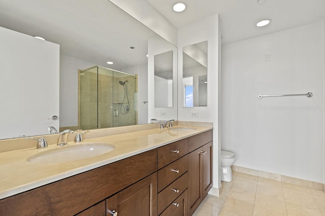 full bath with a shower stall, toilet, double vanity, tile patterned floors, and a sink