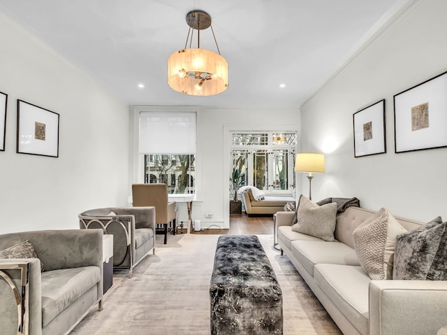 living room with recessed lighting, wood finished floors, and ornamental molding