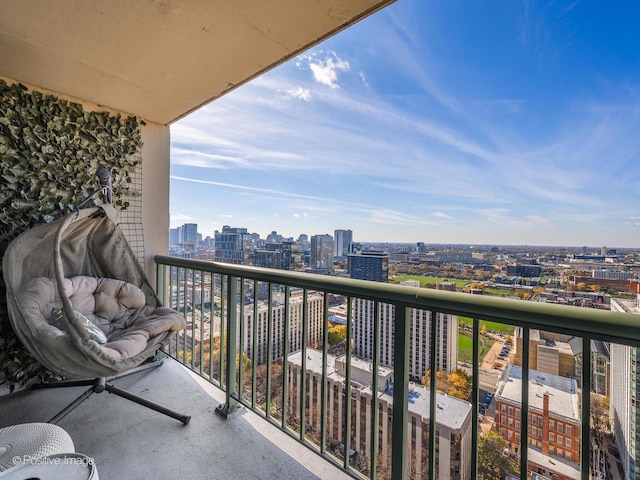 balcony featuring a city view