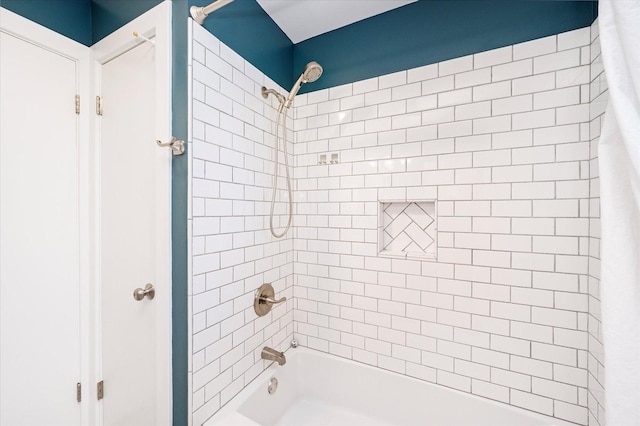 bathroom with shower / tub combo