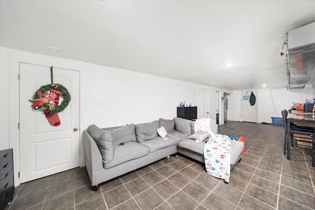 living room with tile patterned flooring