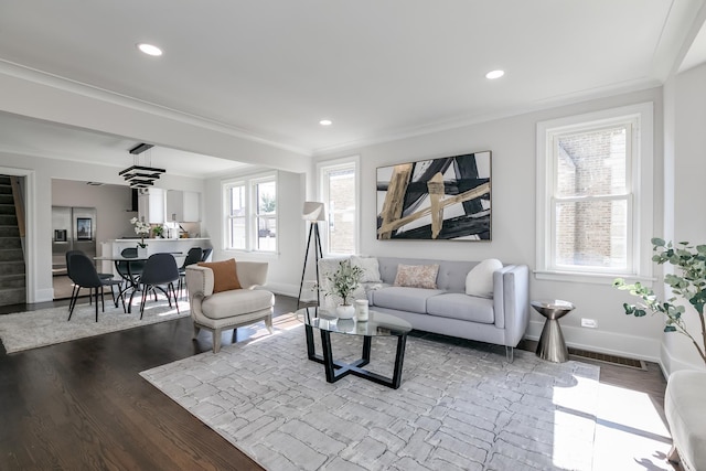 living area with recessed lighting, baseboards, and dark wood-style flooring