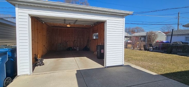 garage with fence