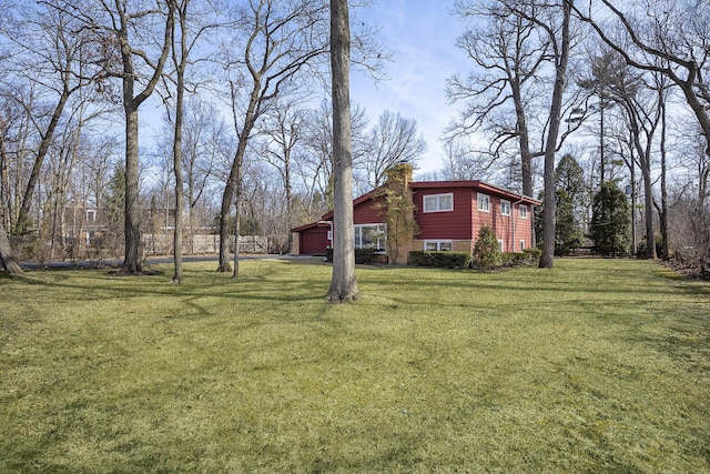 view of yard with an attached garage