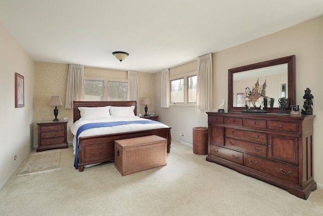 bedroom with light colored carpet