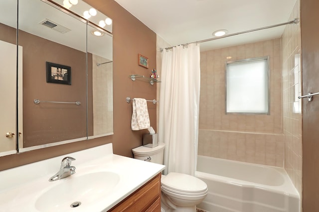 bathroom featuring vanity, toilet, shower / bathtub combination with curtain, and visible vents