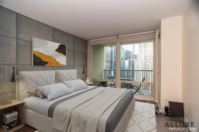 bedroom featuring wood finished floors