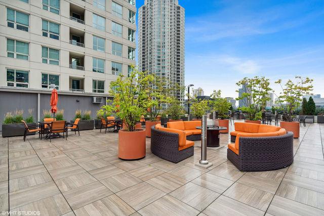 view of patio / terrace featuring outdoor dining area and an outdoor hangout area