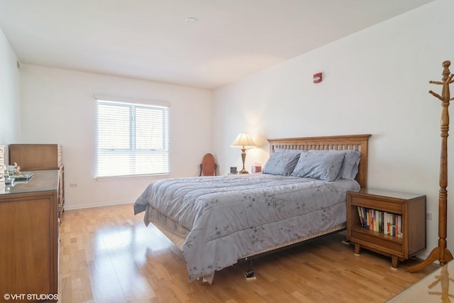 bedroom with light wood-style flooring