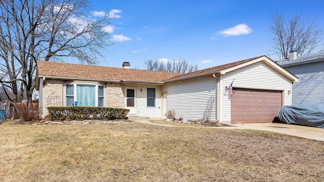 ranch-style home with concrete driveway, an attached garage, a front yard, and stone siding