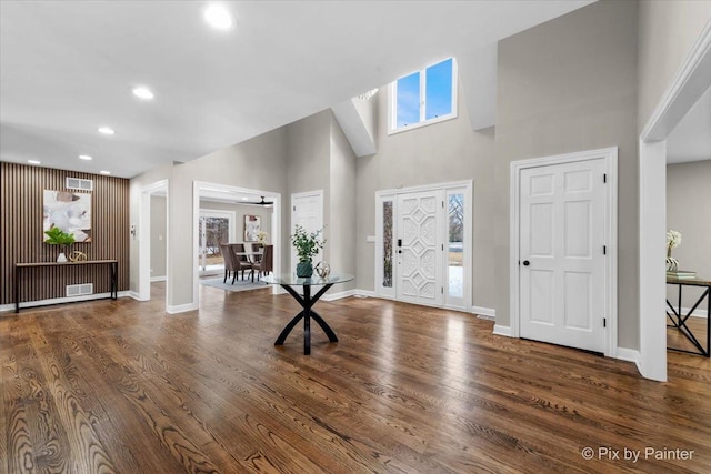 entryway featuring visible vents, recessed lighting, baseboards, and wood finished floors