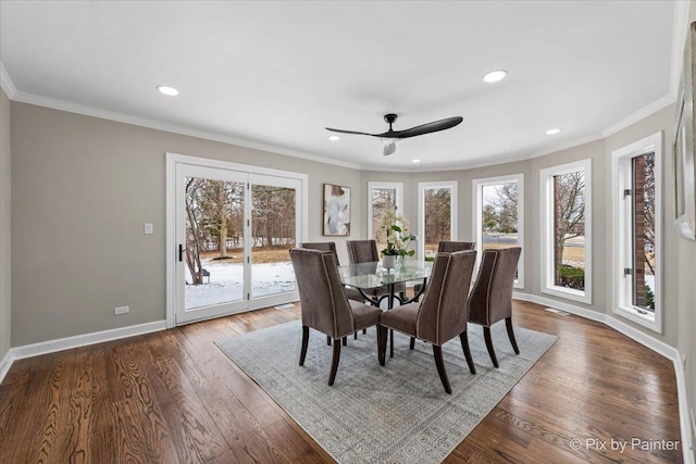 dining space featuring recessed lighting, dark wood-style floors, baseboards, and ornamental molding