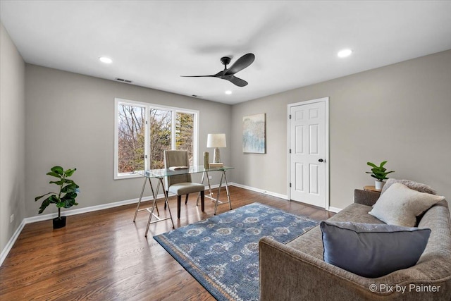 home office with recessed lighting, wood finished floors, and baseboards