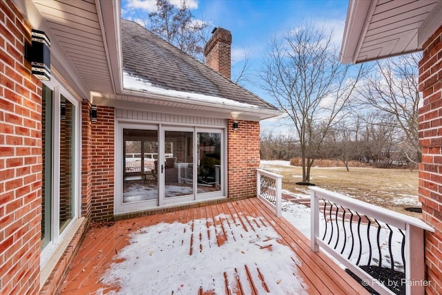 view of snow covered deck