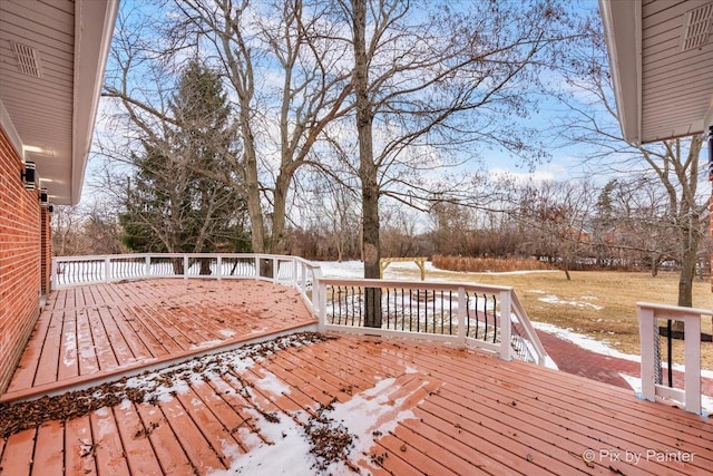 view of snow covered deck