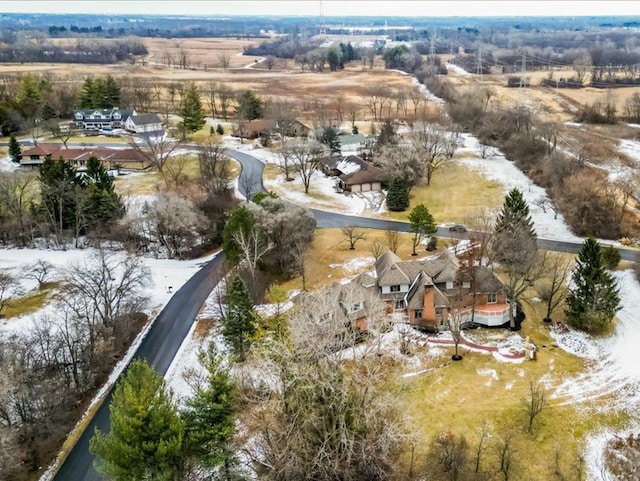 snowy aerial view with a rural view