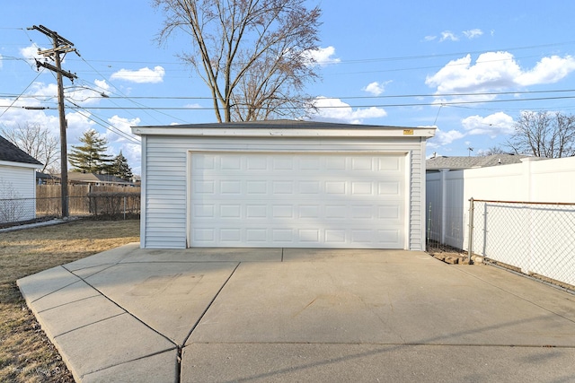 detached garage with fence