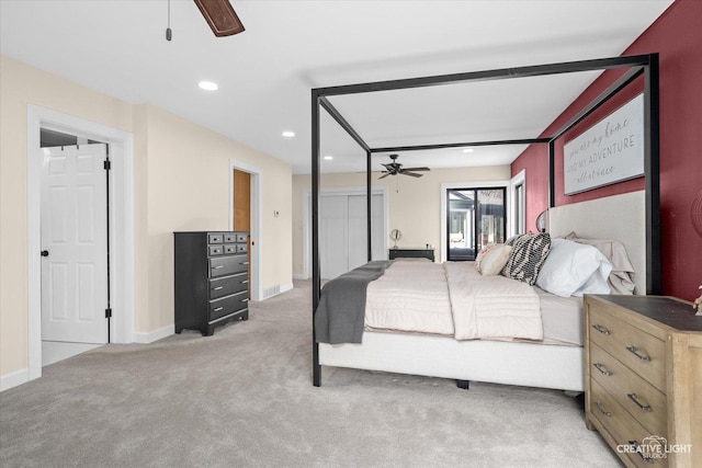 bedroom featuring recessed lighting, light colored carpet, baseboards, and ceiling fan